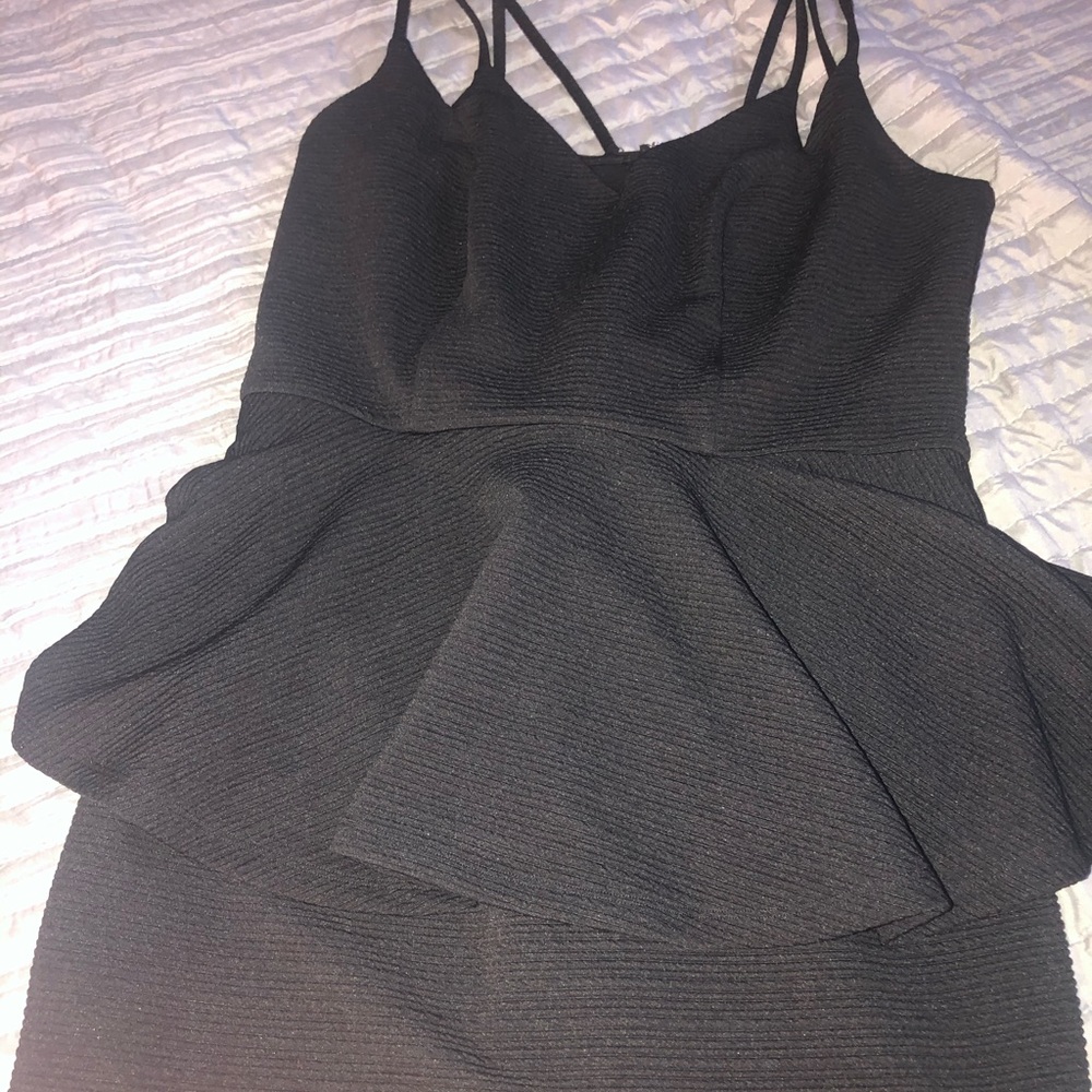 Black peplum dress size 1x like new.